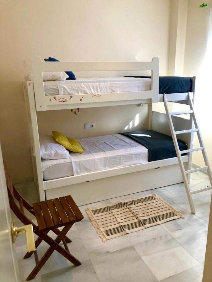 Appartement GATU ATICO SOTAVENTO playa, parking, terraza, piscinas, wifi y aire acc à El Puerto de Santa María Extérieur photo