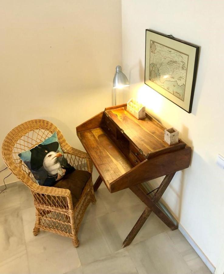 Appartement GATU ATICO SOTAVENTO playa, parking, terraza, piscinas, wifi y aire acc à El Puerto de Santa María Extérieur photo
